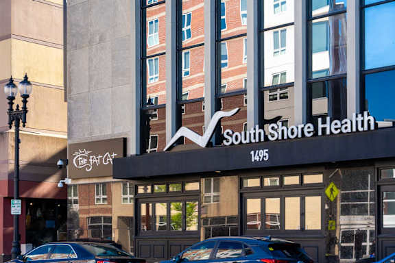 A building with a sign that says South Shore Health.