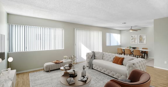 a living room with a couch and a table