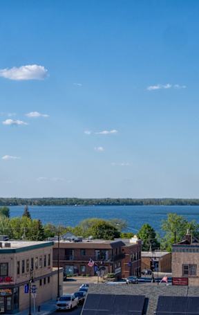 A view of a city with a large body of water at Wilford Apartments, Waconia, Minnesota