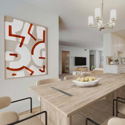 A modern dining room with a wooden table and chairs.