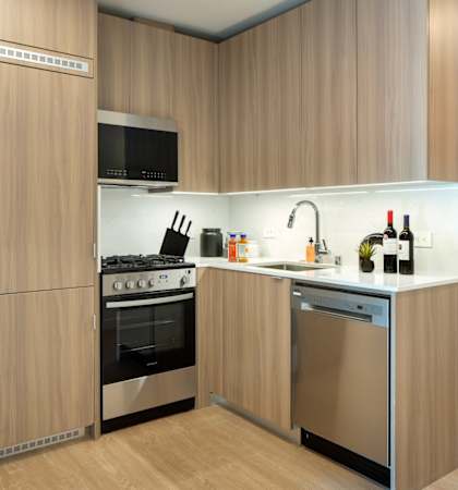 a kitchen with a stove and a sink
