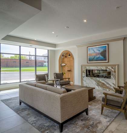 A living room with a fireplace and a couch.