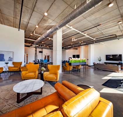 Clubhouse featuring seating and a TV at Wesley Place Apartments in Indianapolis, IN