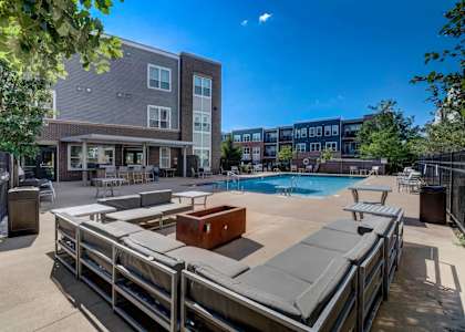 our apartments have a swimming pool and a patio with furniture