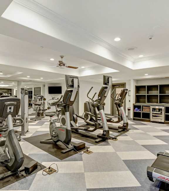 A spacious gym with a variety of exercise equipment. at Apex Mission Valley, San Diego, CA, 92108