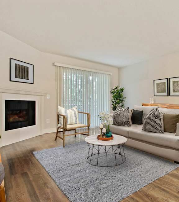 a living room with couches and chairs and a fireplace at Toluca Lofts, Toluca Lake, CA