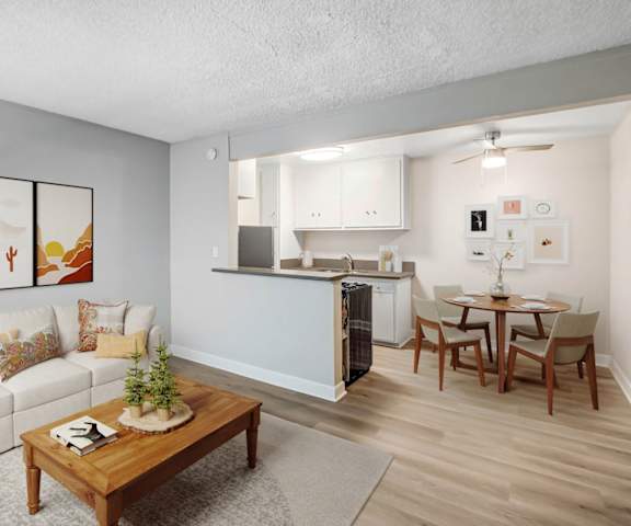 a living room with a couch and a table