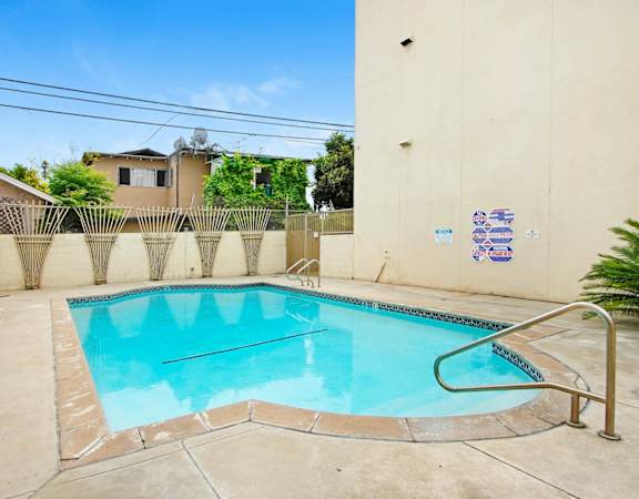 the swimming pool at the villa apartments