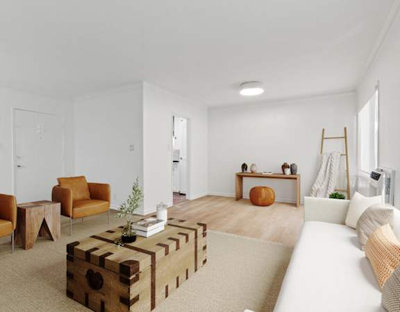 a living room with a couch and a coffee table