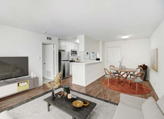 a living room with a couch and a table and a television