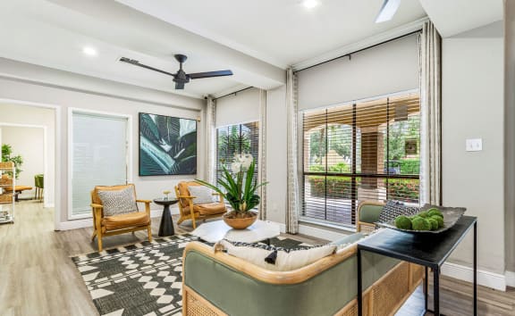 a aerial view of a pool and a house with a yard and trees  at Hidden Palms Apartment Homes, Tampa, Florida