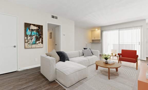 a living room with a couch and a coffee table