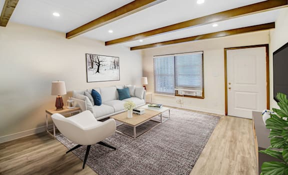 a living room with a couch and a coffee table