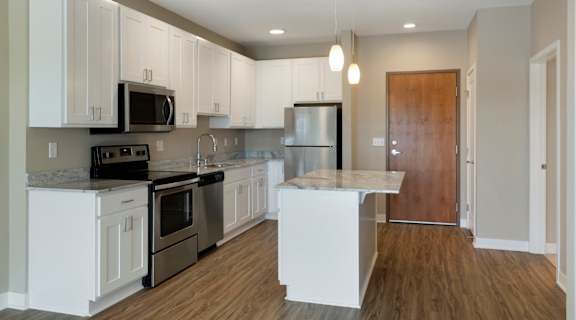 large kitchen w/island at the liberty apartments and town homes in golden valley mn