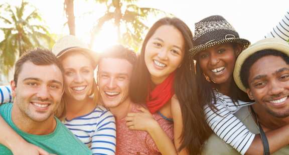 Group of smiling diverse people, side by side