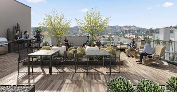 a rendering of a rooftop terrace with tables and chairs at Skylar At Sunset, California
