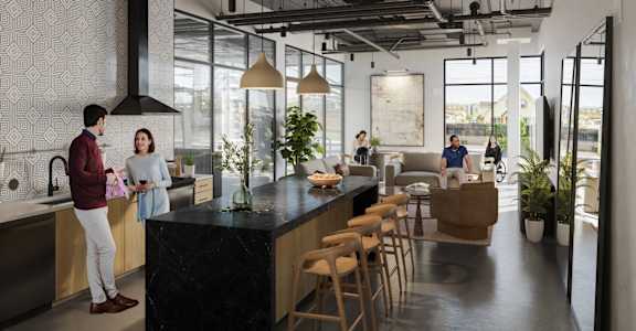 a kitchen with a long counter and people standing around it at Skylar At Sunset, California, 90027