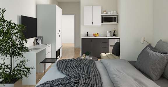 a studio apartment with a bed and a kitchen at Skylar At Sunset, Los Angeles, CA 90027