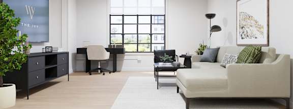 A modern living room with a large window and a couch.