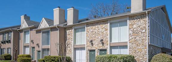 A pool with a sunset in the background.