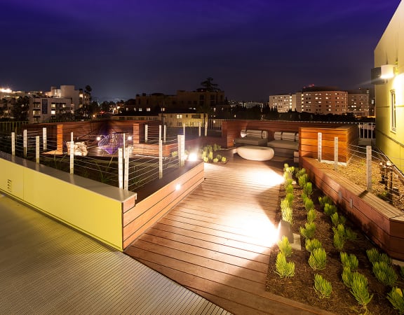 a view of the roof deck at night