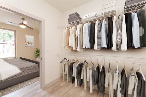 Closet with Clothes on the Wall at Circ Apartments in Richmond, VA 23220
