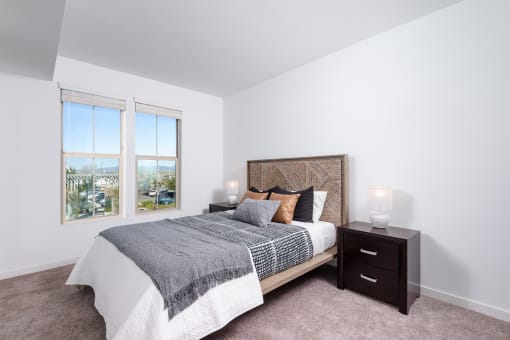 Bedrooms feature plush carpeting and horizontal blinds