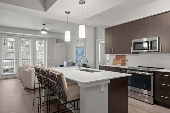 Fully-equipped kitchens with electric top ranges, double-sided refrigerators, built-in microwaves and dishwashers