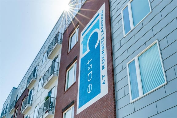 a sign on the side of a building at East 51 At Rocketts Landing, Richmond, 23231