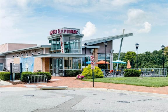 a restaurant with a sign on the front of it at East 51 At Rocketts Landing, Richmond, 23231