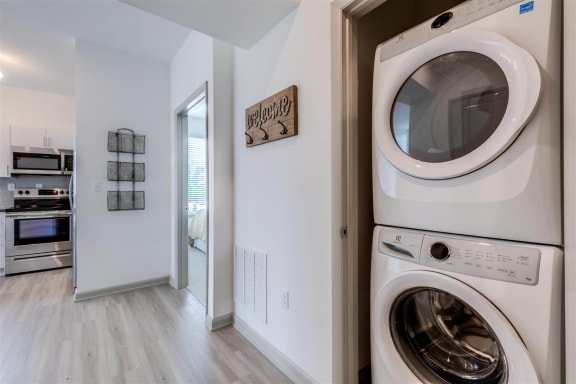 a washer and dryer in a laundry room at East 51 At Rocketts Landing, Richmond, 23231