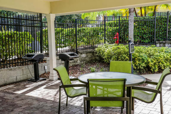 Poolside Grill and Seating at The Arbor Walk Apartments, Florida