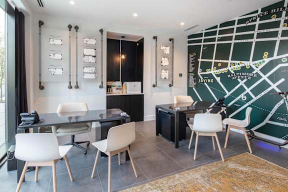 a conference room with a large map on the wall  at The Irvine, Philadelphia