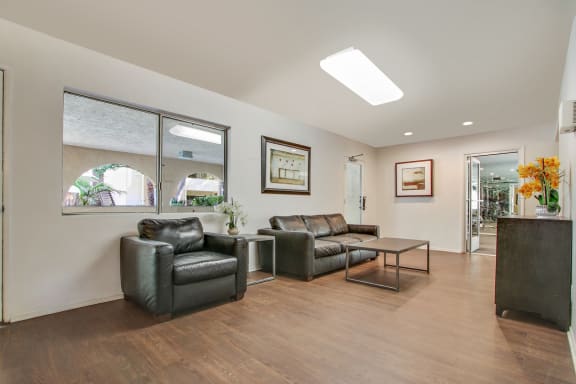 Business center with wood-style flooring