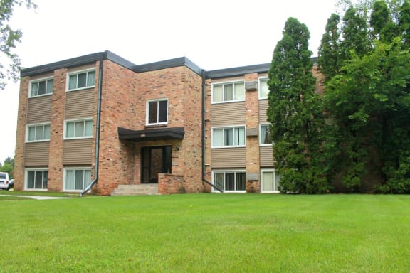 Large Green Yard in Front of Brick Apartment Complex in Minneapolis Minnesota