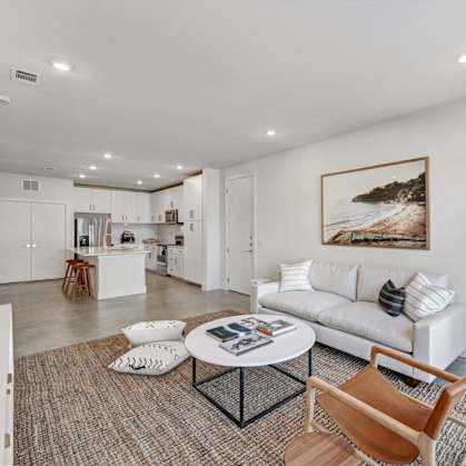 a living room with a couch and a coffee table