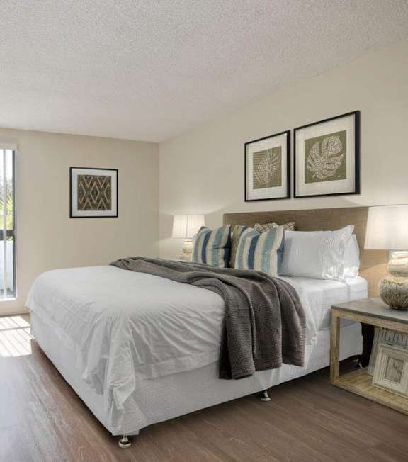 a modern bedroom at Rose Apartments, Los Angeles, CA