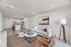 a living room with a couch and a coffee table