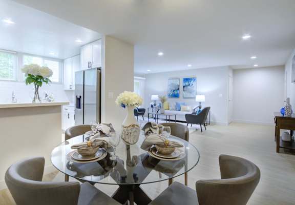 a kitchen and dining area in a 555 waverly unit