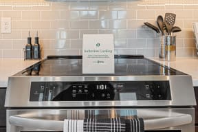  Hamilton Passive House apartments feature induction cooktops that heat pans up to 4 times faster