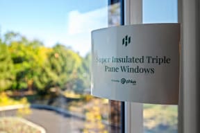 Triple paned windows in Hamilton Passive House create a more comfortable experience