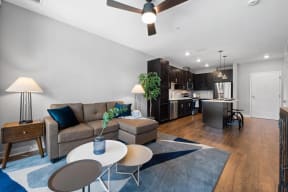 a living room with a couch and a table