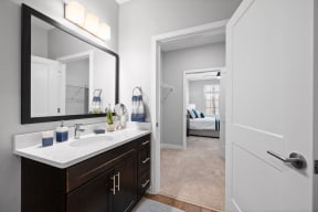 our apartments offer a spacious bathroom with a large mirror