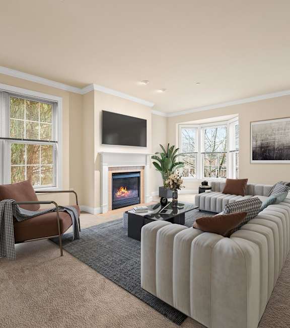 A living room with a fireplace and a couch.