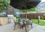 Thumbnail 5 of 12 - AVANT on Market Center - Outdoor grilling station with seating