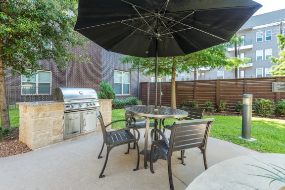 AVANT on Market Center - Outdoor grilling station with seating