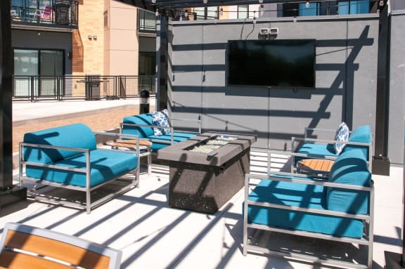 Sundeck with TV lounges and Fire Pit at The Axis, Plymouth, Minnesota