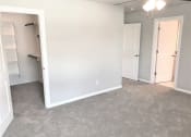 Thumbnail 29 of 60 - B3 (1-car) Master Bed carpeted facing closet