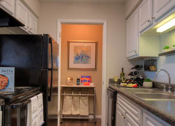 Every kitchen provides plenty of above and below cabinet storage.
