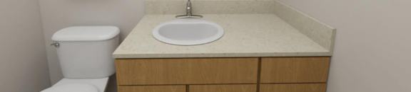 A white toilet sits next to a sink in a small bathroom.